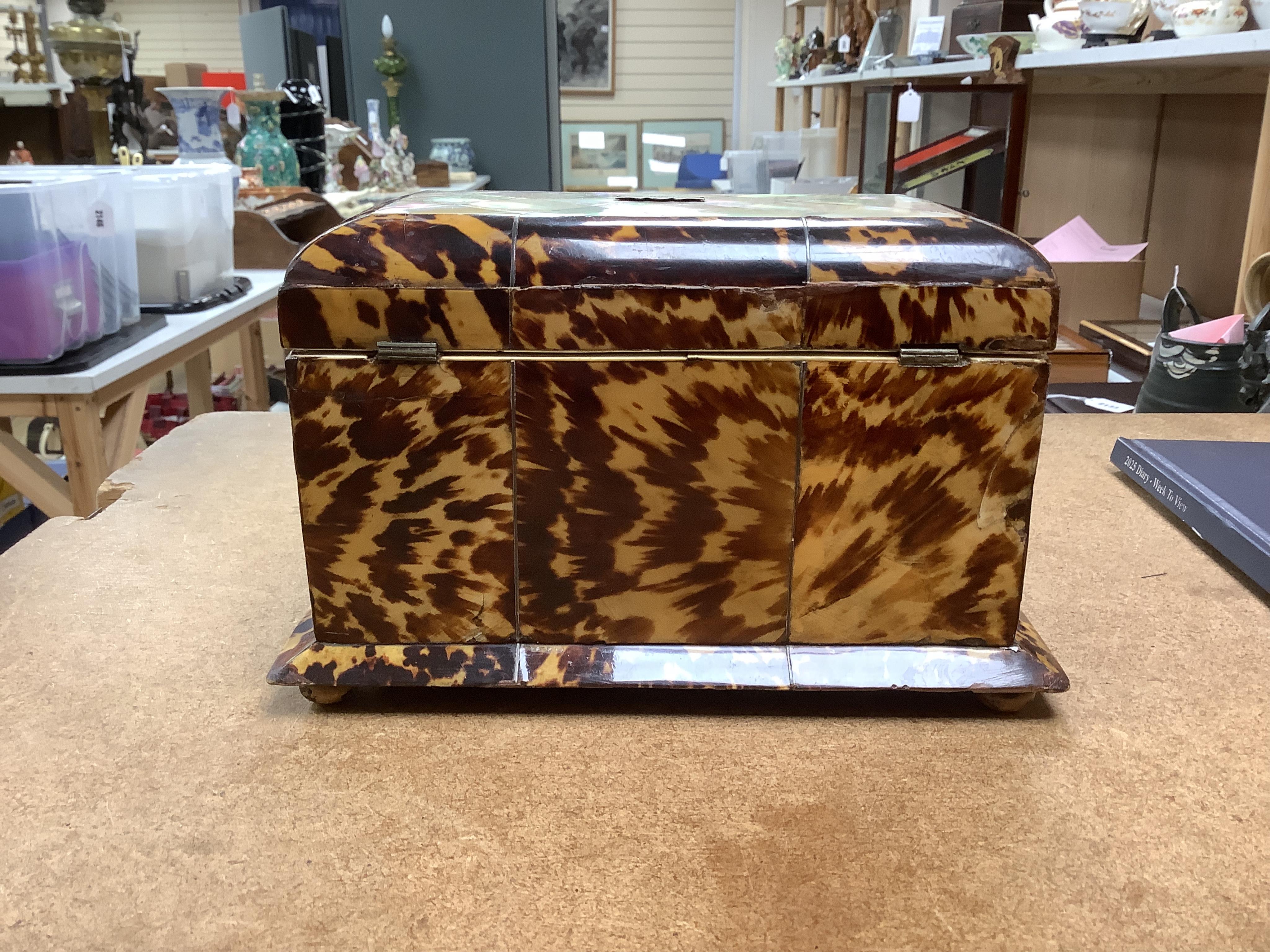 A mid 19th century decorative tortoiseshell and mother of pearl tea caddy, 20cm wide x 12.5cm high CITES Submission reference CXXC25Q1